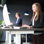 Woman working at a Klöud standing desk
