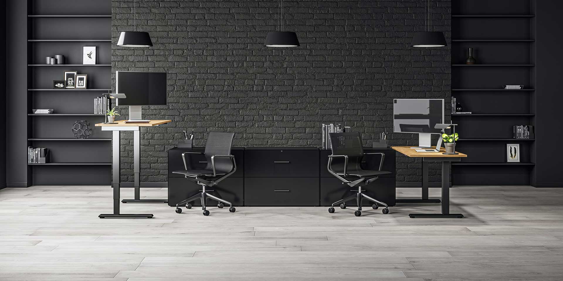 Two Nimbus standing desks in a shared office