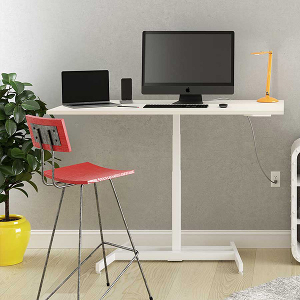 White Ändern Electric standing desk in a compact home office