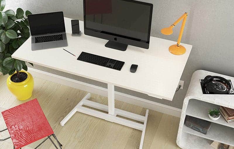 White adjustable desk with open space beneath its work surface